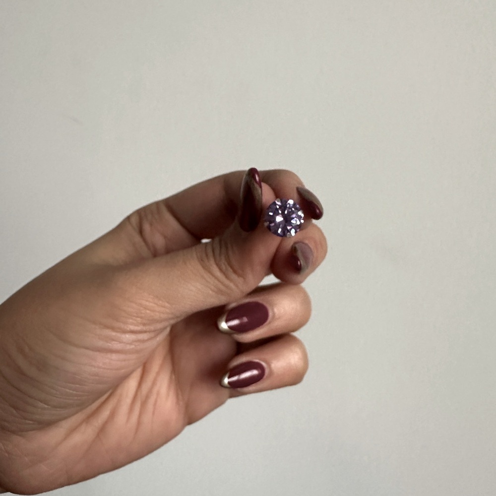 Purple solitaire earrings